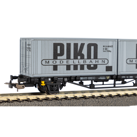 Wagon towarowy platforma DR z 2 kontenerami IV 2x 20ft VEB PIKO 27709 H0